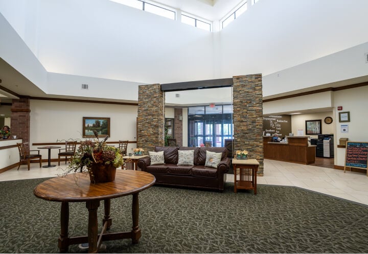 Beautiful Brick Exterior with Green Trim at Memory Care Facility independent-living
